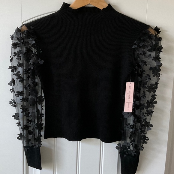 Crave Fame Black Top with Flowers on Sleeves - Picture 1 of 3